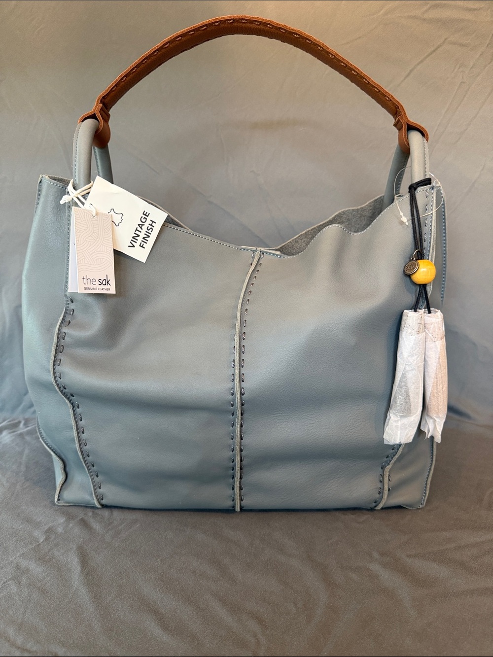 The Sak Leather Hobo Shoulder Bag in Denim with Tan Handle